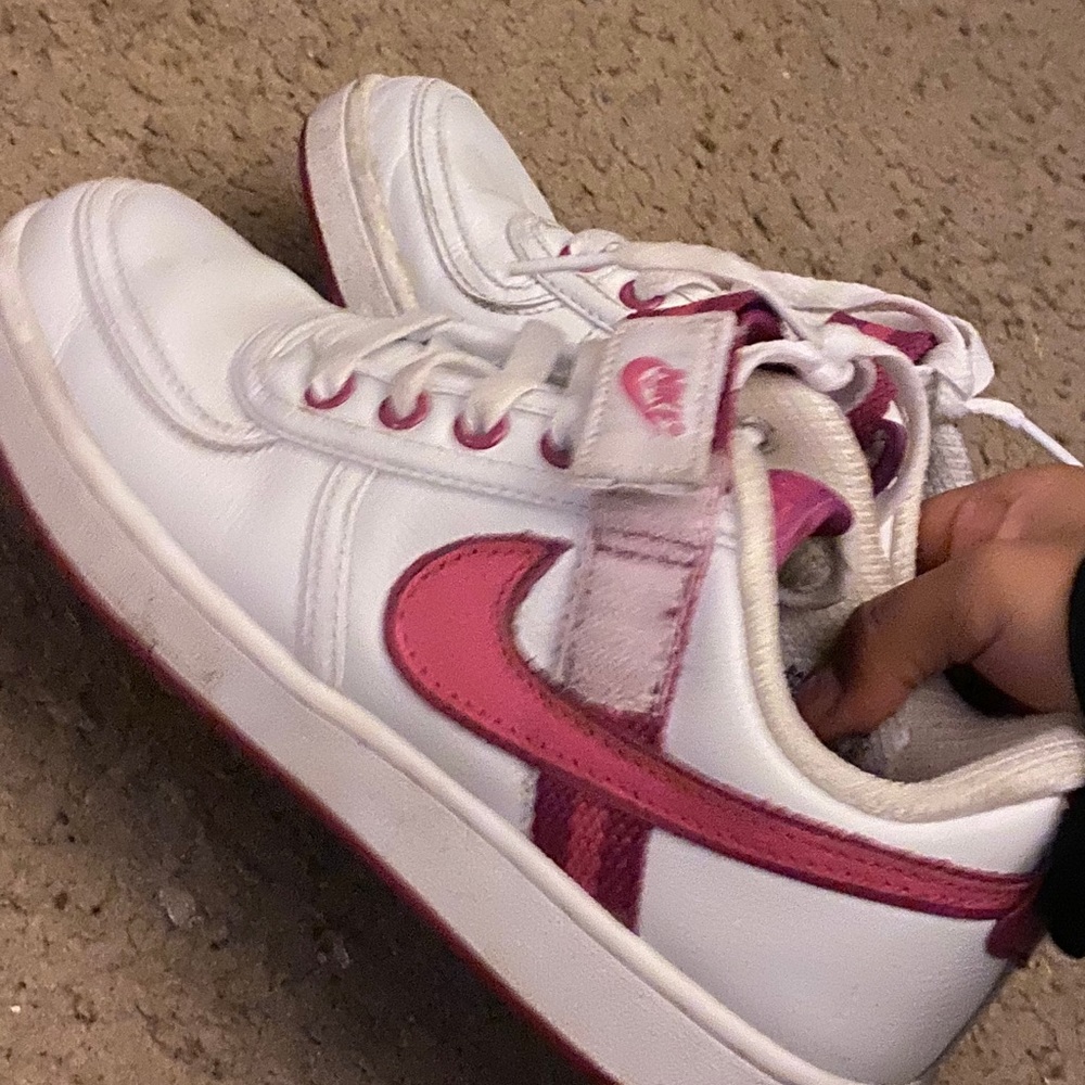 pink and white nike shoes